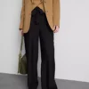 Pantalones palazzo con detalle de moño
