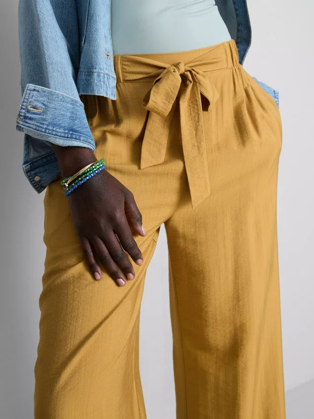 Pantalones palazzo con detalle de moño