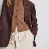 Pantalones palazzo con detalle de moño