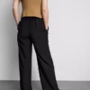 Pantalones palazzo con detalle de moño
