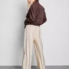 Pantalones palazzo con detalle de moño