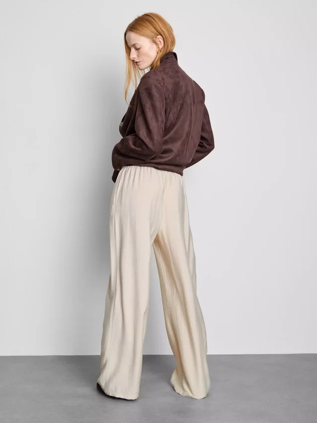 Pantalones palazzo con detalle de moño