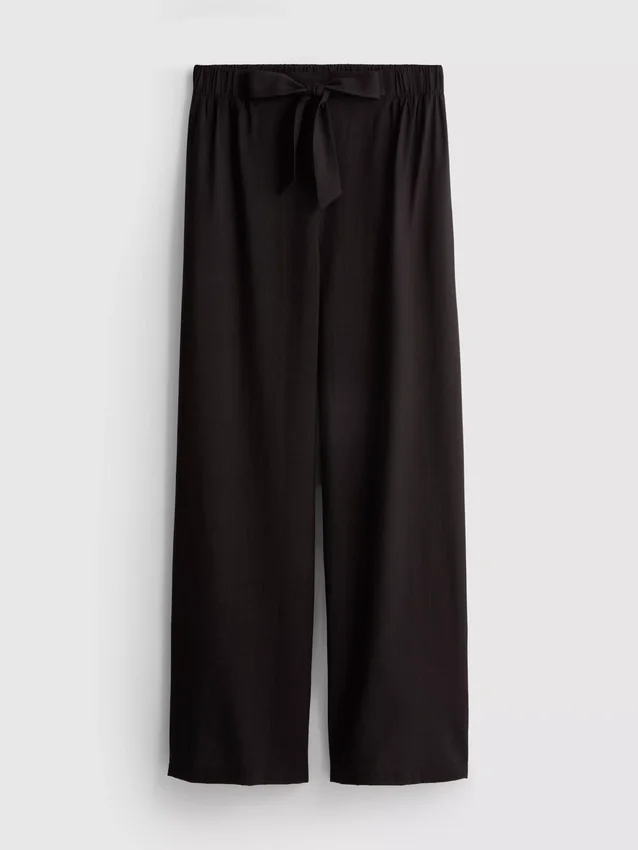 Pantalones palazzo con detalle de moño