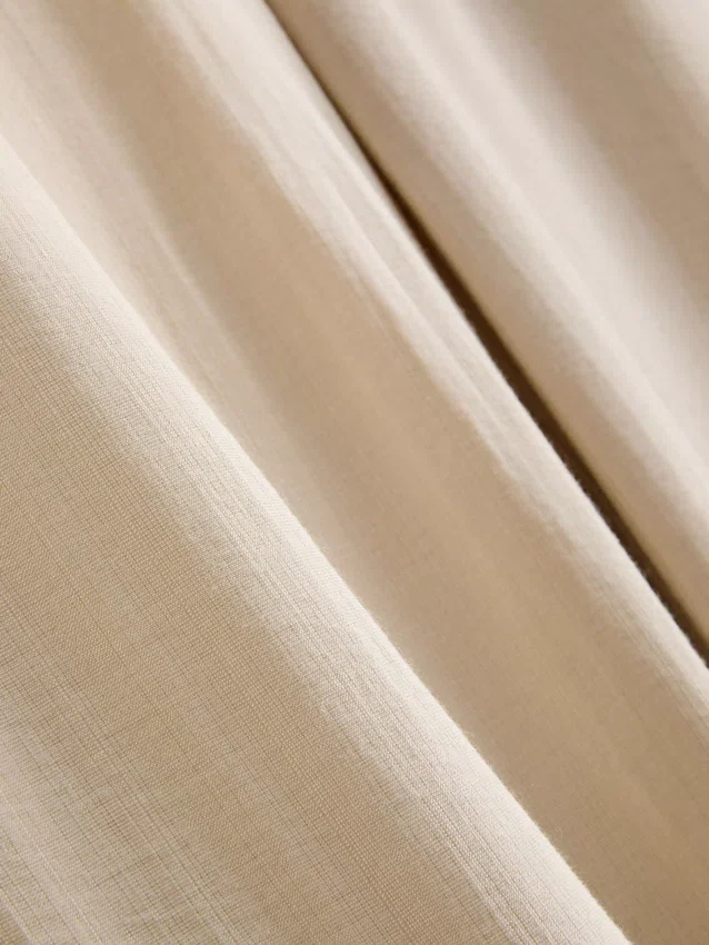 Pantalones palazzo con detalle de moño