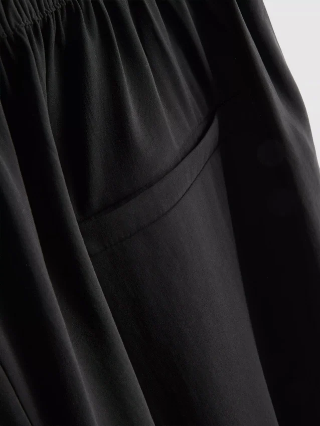 Pantalones tipo culotte de tiro medio y pierna ancha