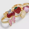 Paquete de 5 anillos con dijes