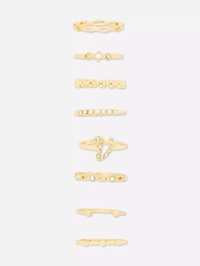 Paquete de 8 anillos con iniciales de strass