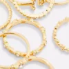 Paquete de 8 anillos con iniciales de strass