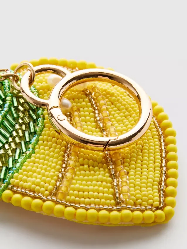 Pinza de garra con detalle de flor