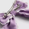 Pinza para el cabello con moño y borde festoneado
