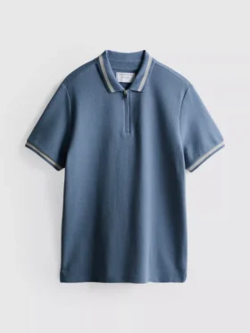Polo con cuello con cremallera y textura