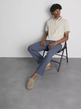 Polo con cuello con cremallera y textura