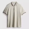 Polo con cuello con cremallera y textura