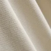 Polo con cuello con cremallera y textura