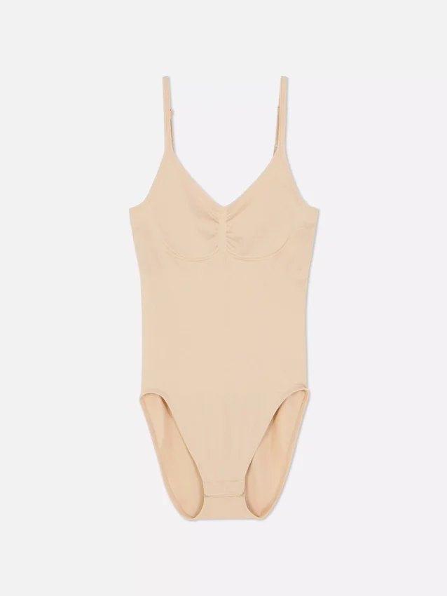 Ropa moldeadora sin costuras con cuello redondo