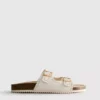 Sandalias con plantilla con detalles cortados a láser