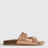 Sandalias con plantilla con detalles cortados a láser