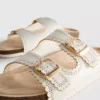 Sandalias con plantilla con detalles cortados a láser