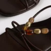 Sandalias de tacón bajo con cuentas