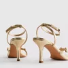 Sandalias de tacón con pedrería floral y horma ancha