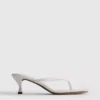 Sandalias tipo mule con talón y tiras entre los dedos