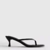 Sandalias tipo mule con talón y tiras entre los dedos