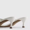 Sandalias tipo mule con talón y tiras entre los dedos