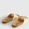 Sandalias tipo mules con correa y hebilla