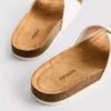 Sandalias tipo mules con correa y hebilla