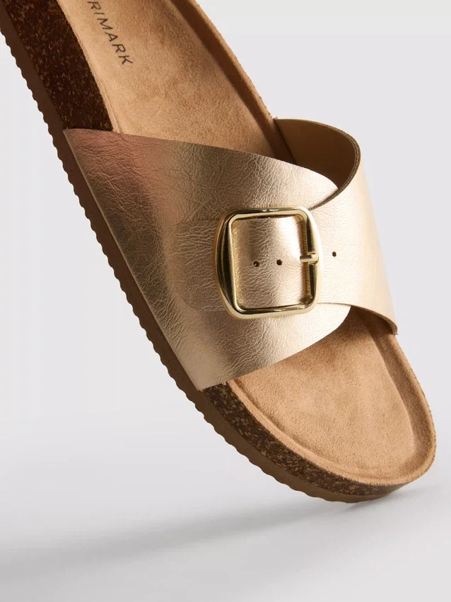 Sandalias tipo mules con correa y hebilla