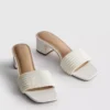 Sandalias tipo mules con tacón grueso y perlas de imitación