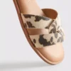 Sandalias tipo mules con tiras cruzadas