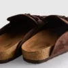 Sandalias tipo zueco con borlas de imitación de gamuza
