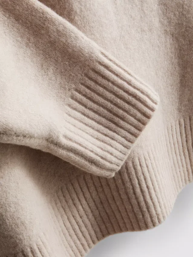 Sudadera con capucha de punto y cordón