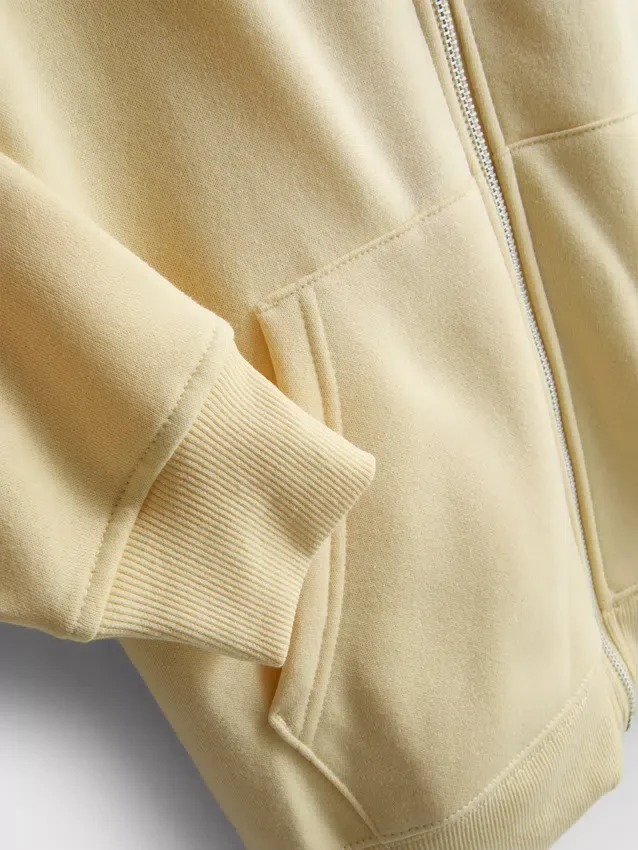Sudadera con capucha y cremallera Essential