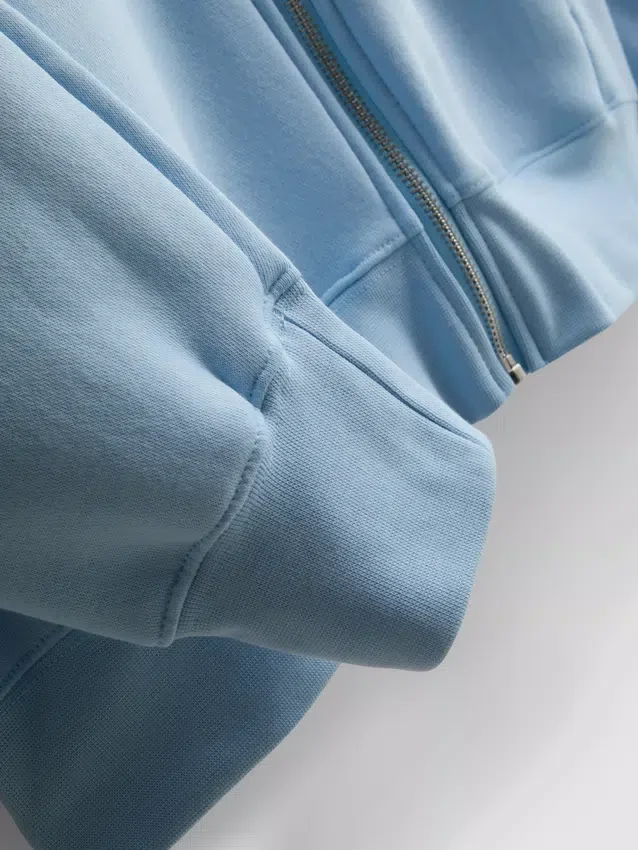Sudadera con capucha y cremallera Essential