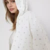 Sudadera con capucha y cremallera floral de alto contenido de algodón