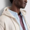 Sudadera con capucha y cremallera imprescindible