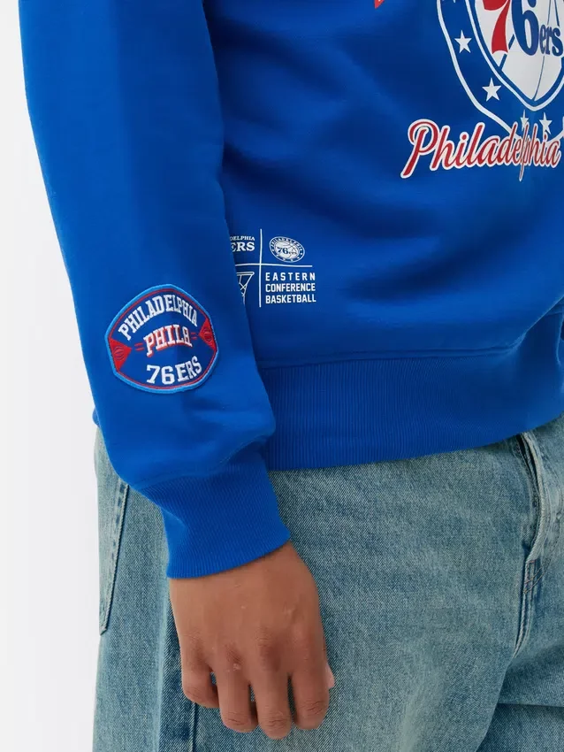 Sudadera con diseño gráfico de los Philadelphia 76ers de la NBA
