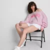 The Primark Scene | Sudadera con hombros al aire y eslogan