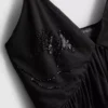 Top babydoll con pedrería de Paula Echevarría