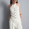 Top con cuello halter y botones, de textura