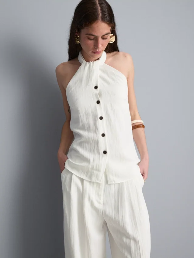 Top con cuello halter y botones, de textura