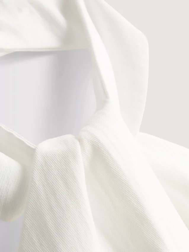 Top con cuello halter y botones, de textura