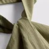 Top con cuello halter y botones, de textura