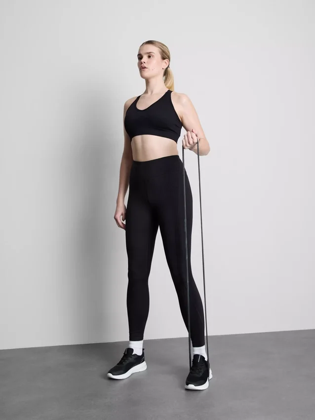 Top corto deportivo sin costuras con espalda cruzada