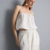 Top corto tipo camisola de algodón bordado