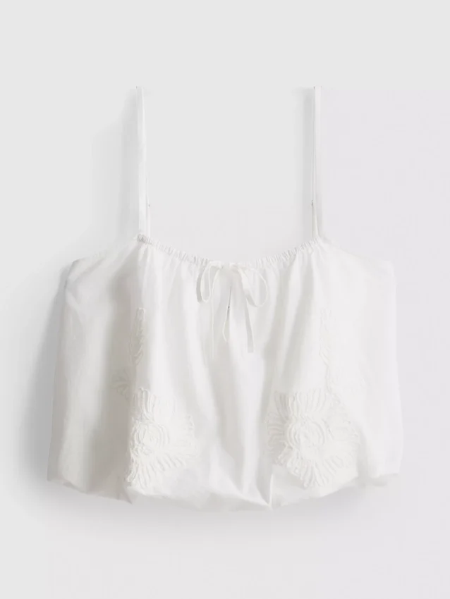 Top corto tipo camisola de algodón bordado