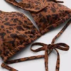 Top de bikini de Paula Echevarría con cuello halter y estampado de leopardo