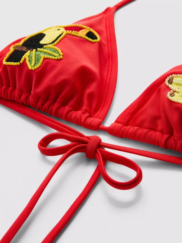 Top de bikini triangular con diseño de tucán